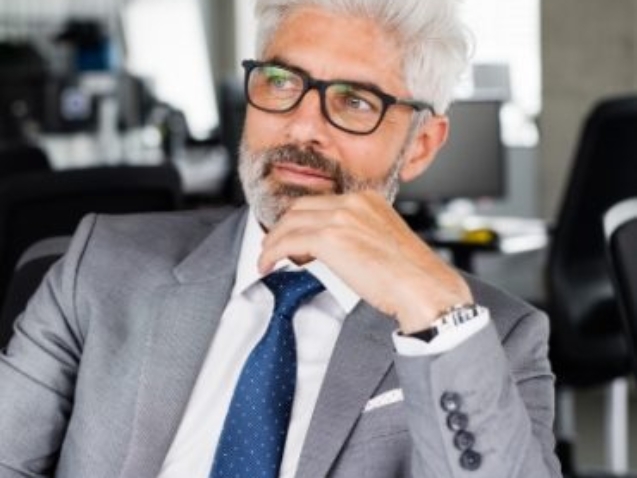 demo-attachment-169-mature-businessman-in-gray-suit-in-the-office-PSEXZSV